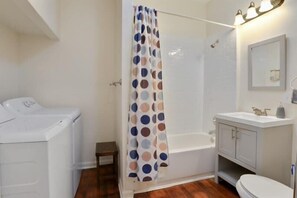 Shower, hair dryer, towels