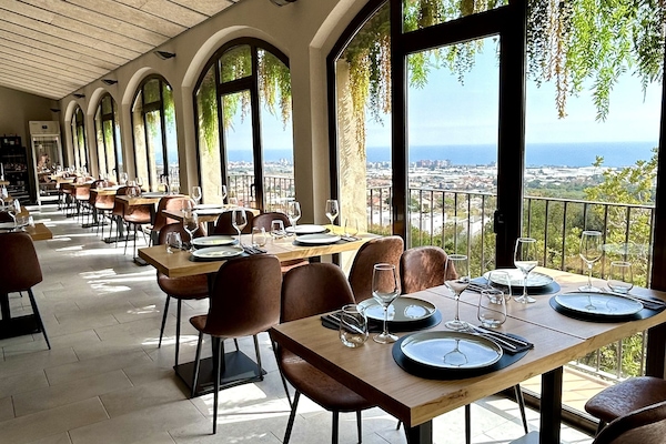 200m from the house, touching la ermita, a charming and good restaurant :)