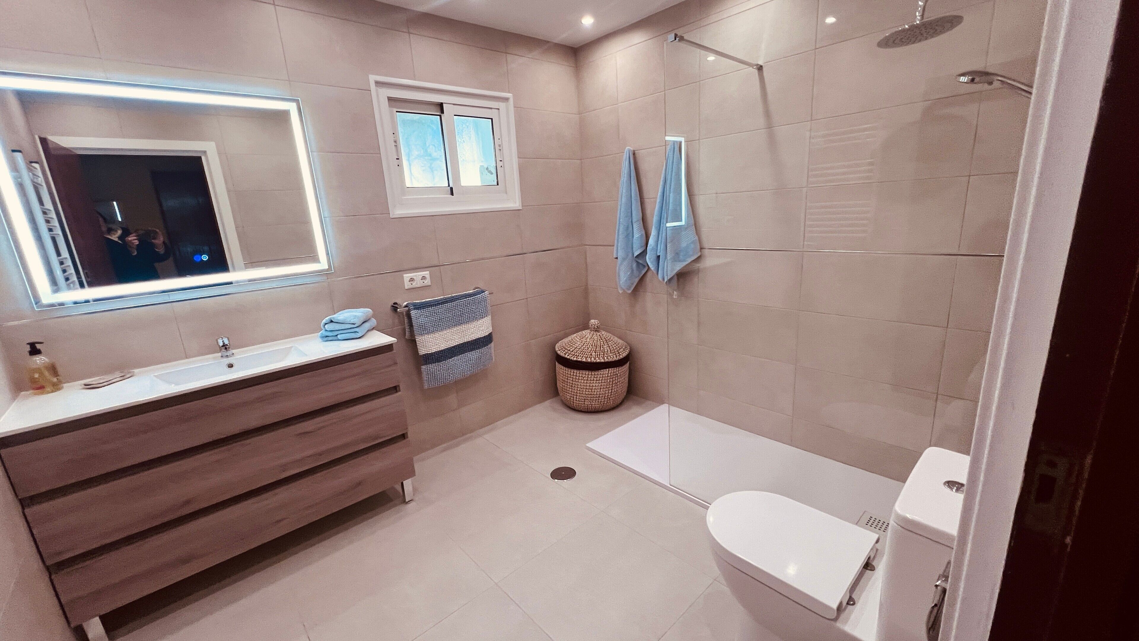 Bathtub, hair dryer, towels