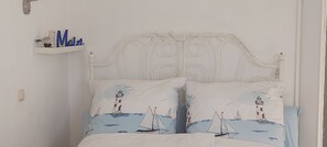 1 bedroom, travel crib, WiFi, bed sheets