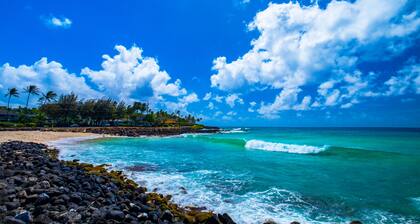 Boutique Condo with Contemporary Art: Steps from Scenic Poipu Beach Trail.