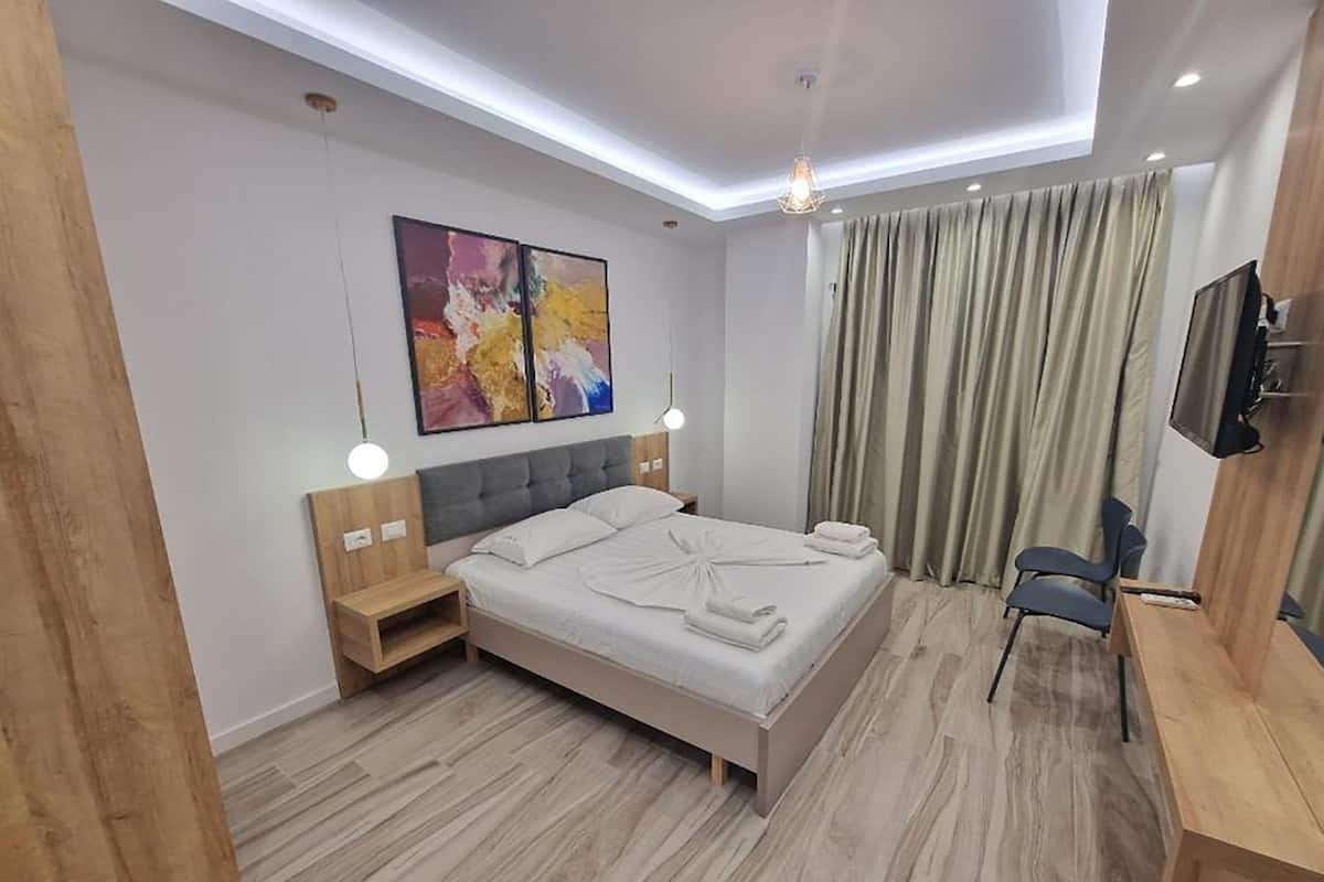 Camera doppia, balcone, vista mare | 1 camera, Wi-Fi gratuito