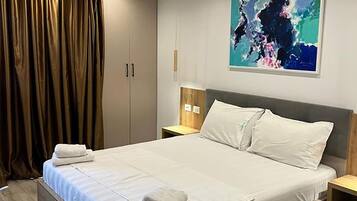 Chambre Quadruple, balcon | 1 chambre, Wi-Fi gratuit
