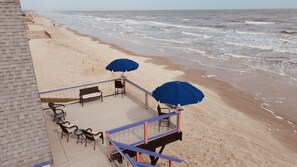 On the beach, sun loungers