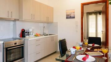 Oven, coffee/tea maker, toaster, cookware/dishes/utensils