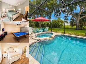 A bedroom with a bed, bedside tables, and a TV. - Lovely Pool Home With Spa & Games Room Close to WDW (Clermont)