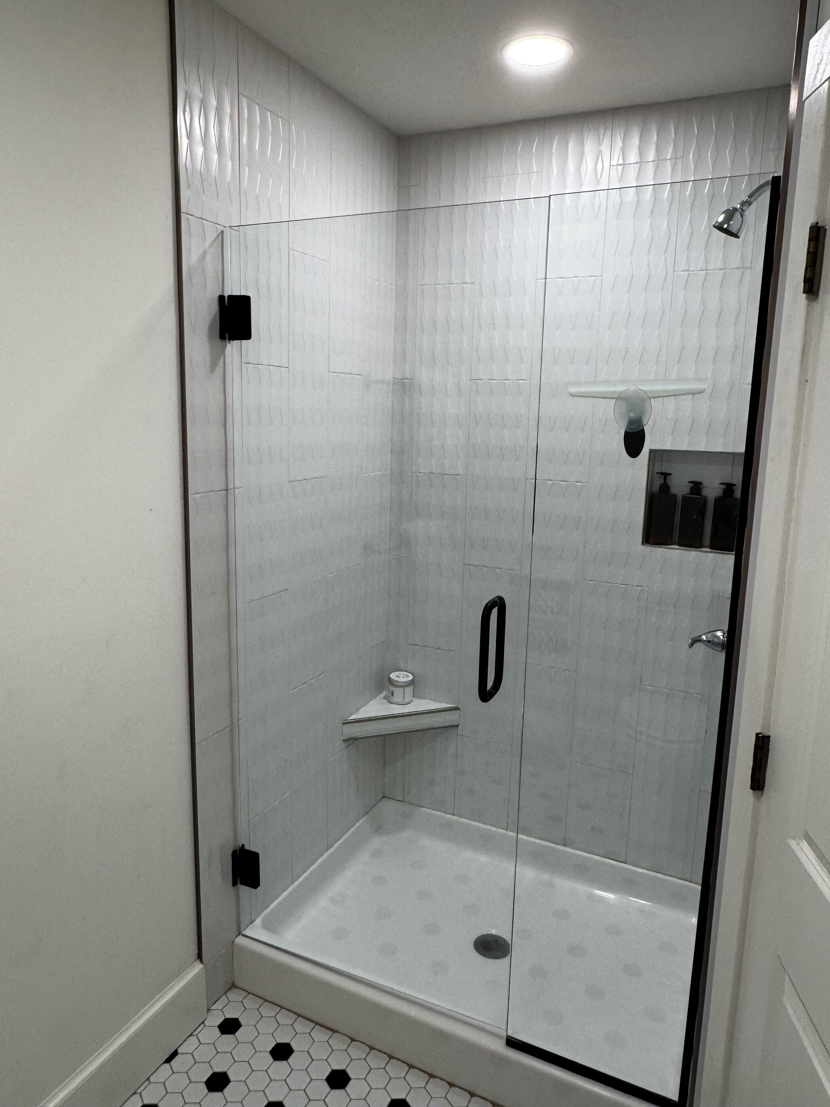 Shower, towels, soap, toilet paper
