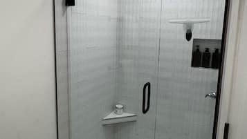 Shower, towels, soap, toilet paper