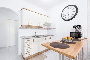 Microwave, stovetop, coffee/tea maker, highchair
