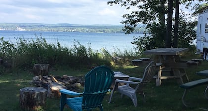 Get lulled to sleep by Lake Superior in Vintage camper 5 steps from the water