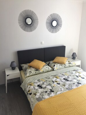 Departamento | 1 habitación, tabla de planchar con plancha, wifi gratis y ropa de cama 