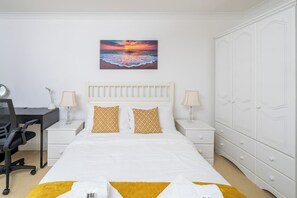 2 bedrooms, desk, iron/ironing board, travel crib