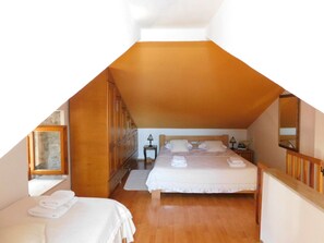 1 bedroom, desk, iron/ironing board, travel crib