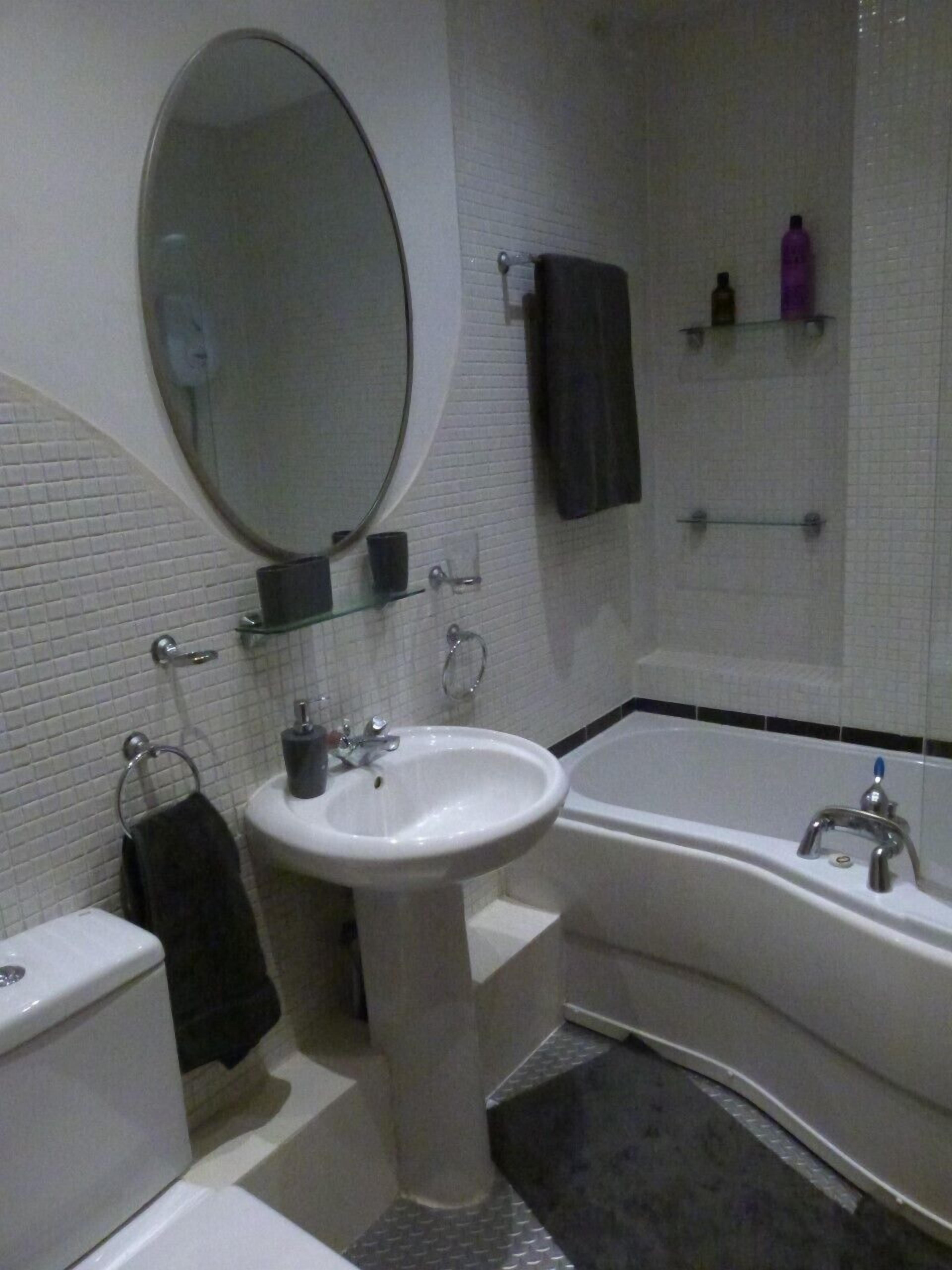 Combined shower/tub, hair dryer, towels, soap