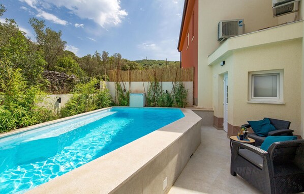 Piscine extérieure, piscine chauffée
