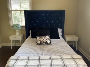 3rd bedroom with with a full size bed . Jack and John bathroom 