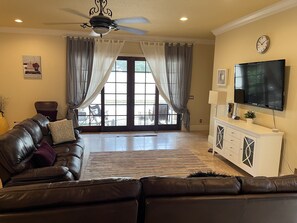 Family room with reclining sofa chairs 
