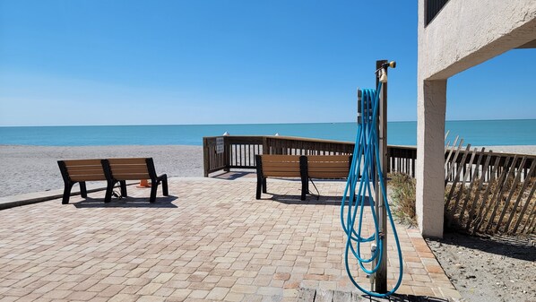 On the beach, sun loungers, beach towels