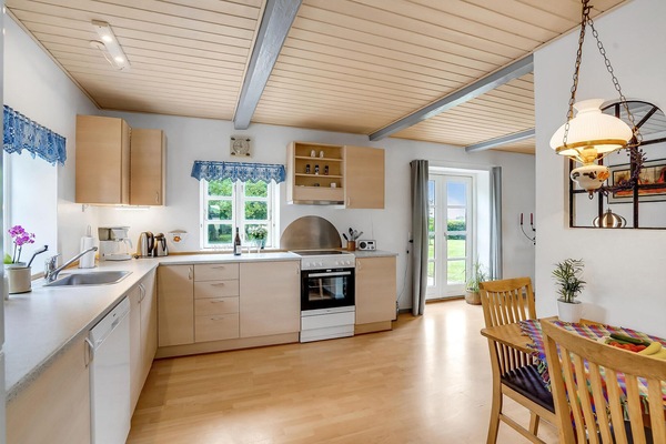 Fridge, stovetop, dishwasher, coffee/tea maker