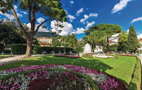 Stunning garden area with a variety of flowering plants arranged in beautiful patterns.