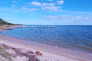 Una spiaggia nelle vicinanze, teli da spiaggia