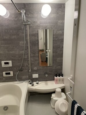 Apartment, 4 Bedrooms | Bathroom | Hair dryer, slippers, bidet, soap