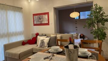Apartment, 4 Bedrooms | Living area | TV