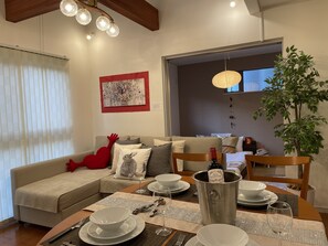 Apartment, 4 Bedrooms | Living area | TV