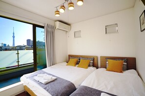 Apartamento, 4 quartos | Cortinas blackout, ferros/tábuas de passar roupa, Wi-Fi de cortesia