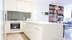 Standard Apartment | Private kitchen - Signature Holiday Homes (Dubai)