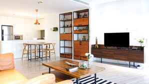 Standard Apartment | Living area - Signature Holiday Homes (Dubai)