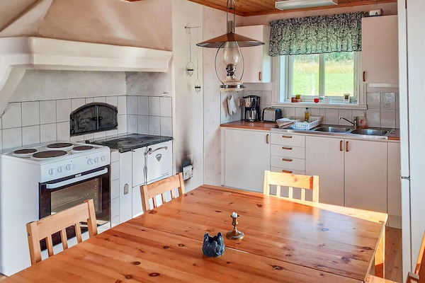 Een koelkast, een kookplaat, een vaatwasser