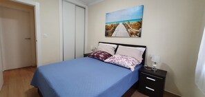 2 bedrooms, in-room safe, iron/ironing board, travel cot