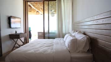Deluxe Room, 1 King Bed, Beach View | 1 bedroom, premium bedding, individually furnished, desk