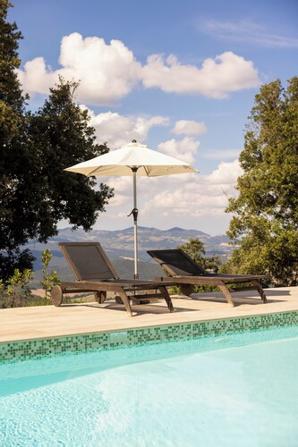 A stone farmhouse from 1850 with a pool for nature lovers