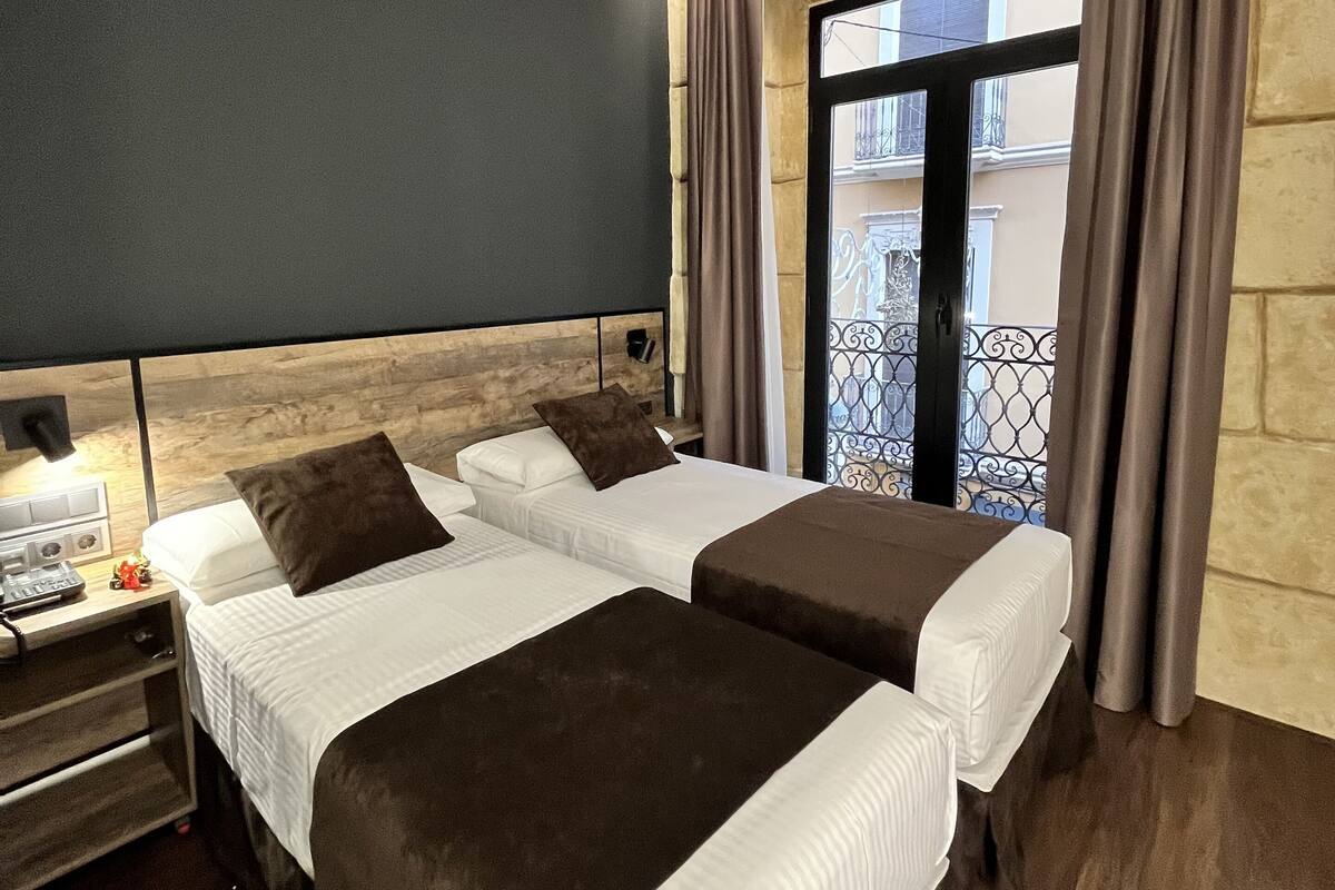 City Double Room | Minibar, in-room safe, desk, blackout curtains
