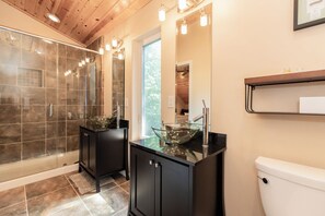 Combined shower/tub, hair dryer, towels, toilet paper