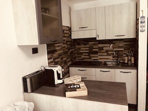 Fridge, microwave, cookware/dishes/utensils
