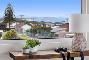 Enjoy a peaceful view of the surrounding neighborhood from this serene room.