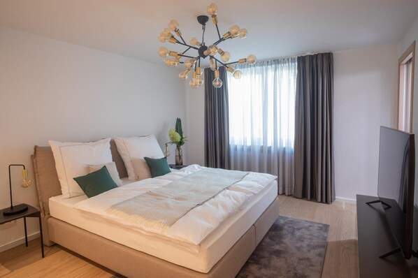 2 dormitorios, caja fuerte, tabla de planchar con plancha y wifi gratis