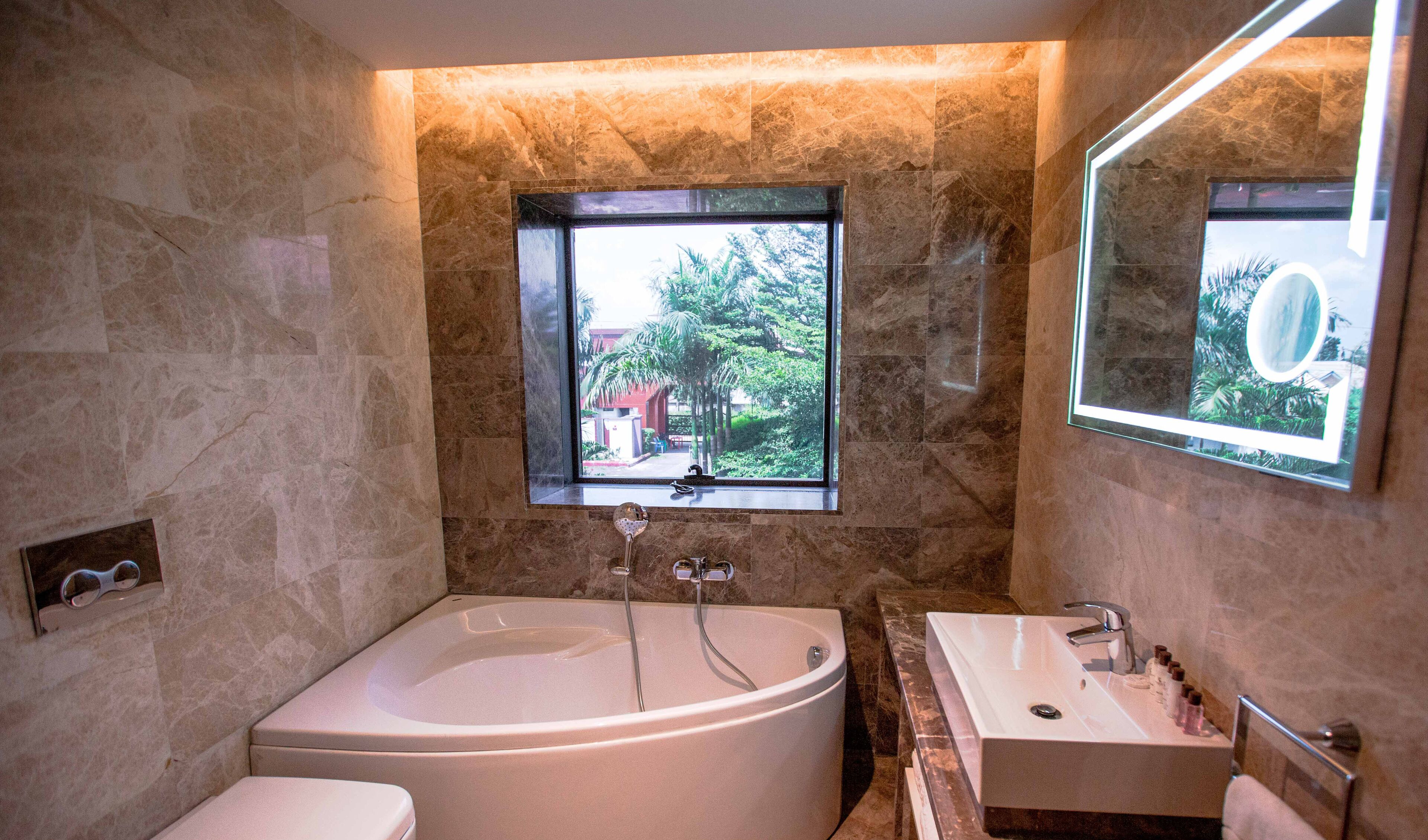 presidential suite | bathroom | designer toiletries, hair dryer, bathrobes, slippers