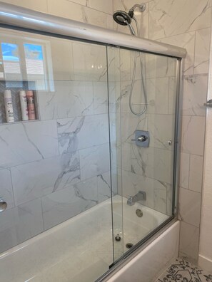 Hair dryer, towels, soap, toilet paper