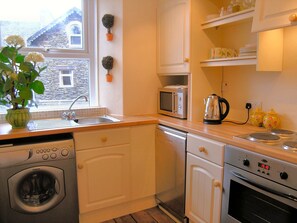 Dishwasher, high chair, cookware/dishes/utensils