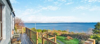 Enjoy stunning sea views from this traditional cottage on the coast of Arran.