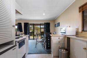 Fridge, microwave, toaster, cookware/dishes/utensils