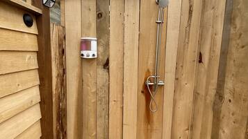 Bathtub, hair dryer, towels
