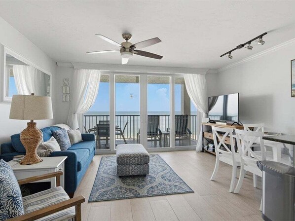 TV - Beachfront 1BR Apollo condo with pool, WiFi, kitchen, and Gulf views. (Marco Island)
