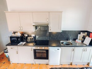 Dishwasher, high chair, cookware/dishes/utensils