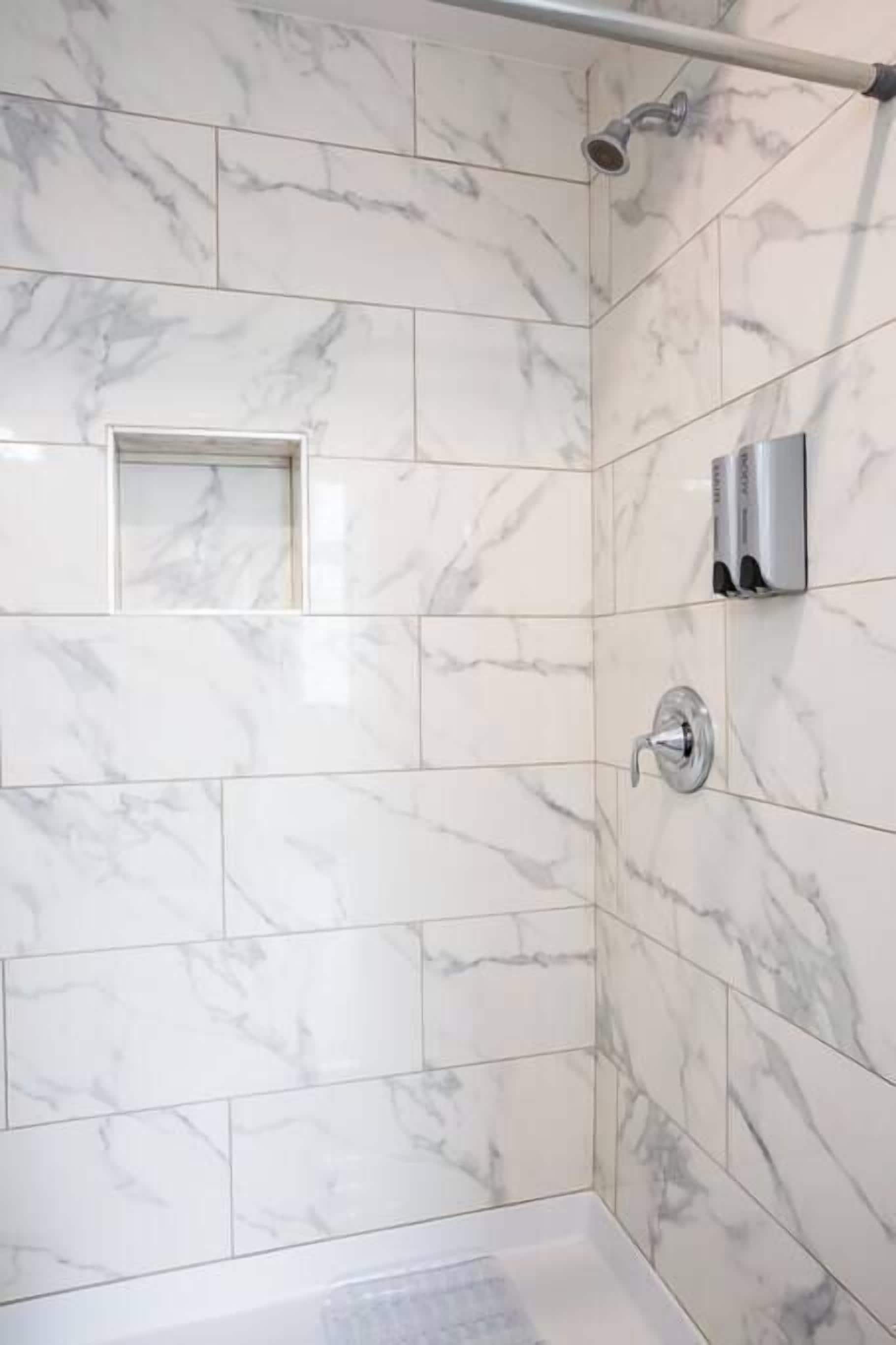 Shower, hair dryer, towels, shampoo