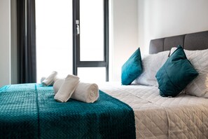 2 dormitorios, tabla de planchar con plancha, wifi gratis y ropa de cama